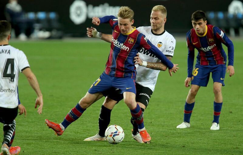 Frenkie De Jong 7 - Instinctive runs in behind Valencia lines saw the Dutchman in plenty of good positions, but the midfielder should have had an assist when picking out Pedri inside the box early on. A strong header from an Alba cross was eventually palmed into Griezmann to take the lead. AP