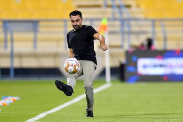 (FILE) Al Sadd's head coach Xavi Hernandez, controls the ball during the Qatar Stars League soccer match between Al Sadd and Al Ahli in Doha, Qatar, 30 October 2021 (reissued 05 November 2021).  Al-Sadd's Executive Director, Turki Ali-Ali, released a statement on 05 November 2021 to announce that its head coach Xavi Hernandez was free to transfer to FC Barcelona upon payment of the contractual termination clause.   EPA / NOUSHAD THEKKAYIL