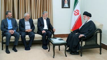 Iran's supreme leader Ayatollah Ali Khamenei, right, with Palestinian Islamic Jihad leader Ziad Al Nakhaleh, second right, in Tehran. AP