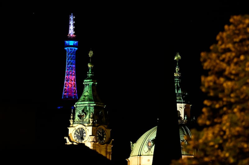 Petrin Lookout Tower in Prague, the Czech Republic, is lit in British colours in honour of Queen Elizabeth. AP
