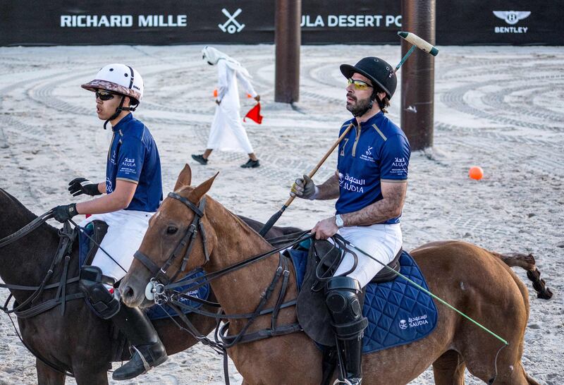 Prince Salman Bin Mansour, left, and Saudi scientist Hosam Zawawi on their horses.