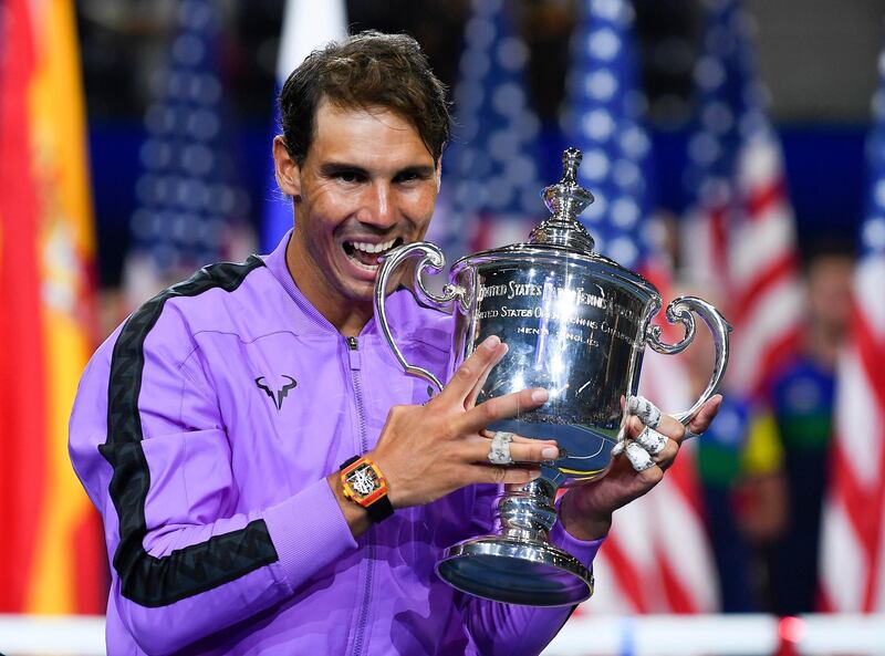 Sept 8, 2019; Flushing, NY, USA;  Rafael Nadal of Spain celebrates with the championship trophy after beating Daniil Medvedev of Russia in the men’s singles final on day fourteen of the 2019 U.S. Open tennis tournament at USTA Billie Jean King National Tennis Center. Mandatory Credit: Robert Deutsch-USA TODAY Sports