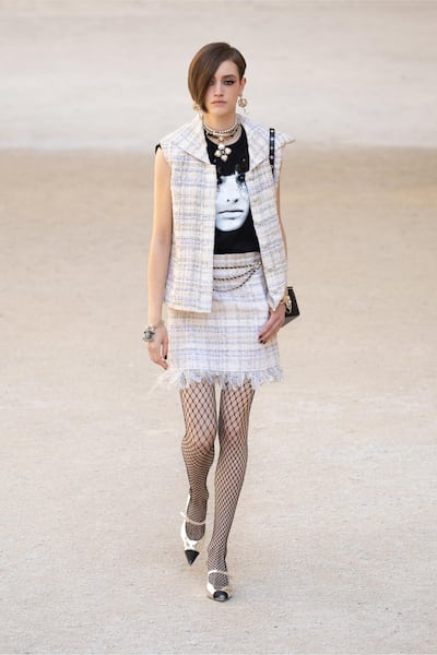 Classic Chanel tweed was mixed with a graphic tee for cruise 2021/22. Courtesy Chanel