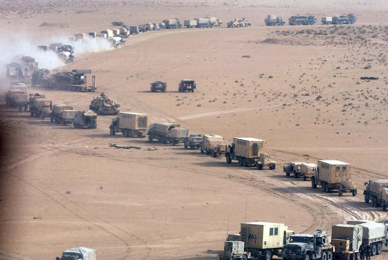 A long US military convoy moving inside an unspecified area of southern Iraq on March 21, 2003. US and British forces were poised to capture the city of Basra on day two of the war to topple President Saddam Hussein. AFP