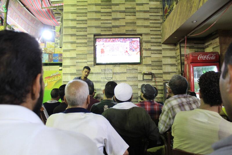 Liverpool fans celebrate in Cairo. Adham Youssef