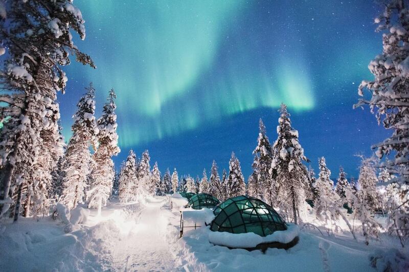 Glass Igloos at Kakslauttanen Arctic Resort with the Northern Lights. Valtteri Hirvonen / Kakslauttanen Arctic Resort