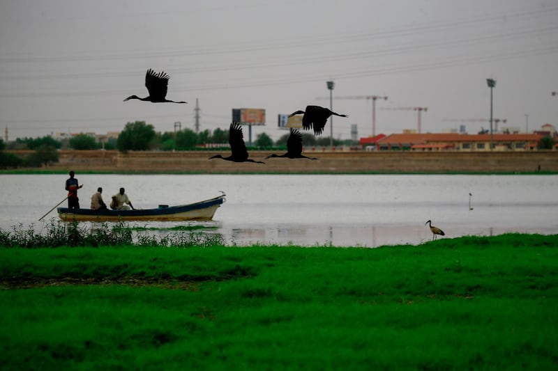 Fishermen sail across the Nile river in the Sudanese capital Khartoum on June 9, 2020.  / AFP / ASHRAF SHAZLY
