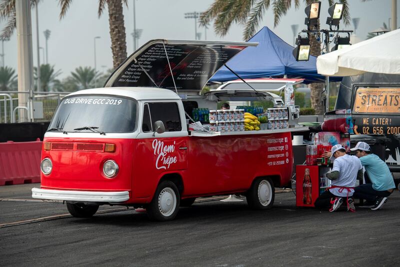 The camper van crepe crew ready the chocolate spread.