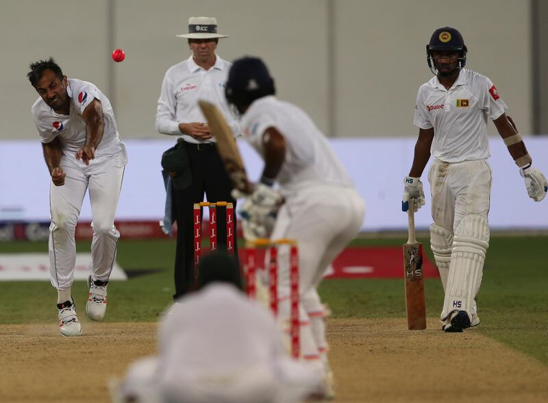 Pakistan's Wahab Riaz throws the ball during their third day at Second Test cricket match against in Dubai, United Arab Emirates, Sunday, Oct. 8, 2017. (AP Photo/Kamran Jebreili)