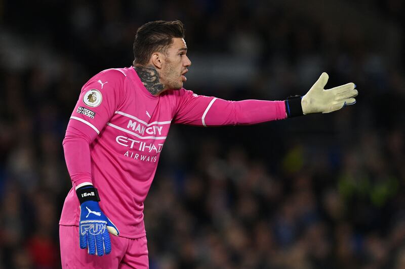 MANCHESTER CITY RATINGS: Ederson – 6. Spent much of the first half watching a devastating performance in front of him. When called into action, he looked confident and reliable as ever as he got down low to keep Trossard out. Gave away a penalty after catching Zambian midfielder Mwepu. Couldn’t keep it out. Booked for time wasting. AFP