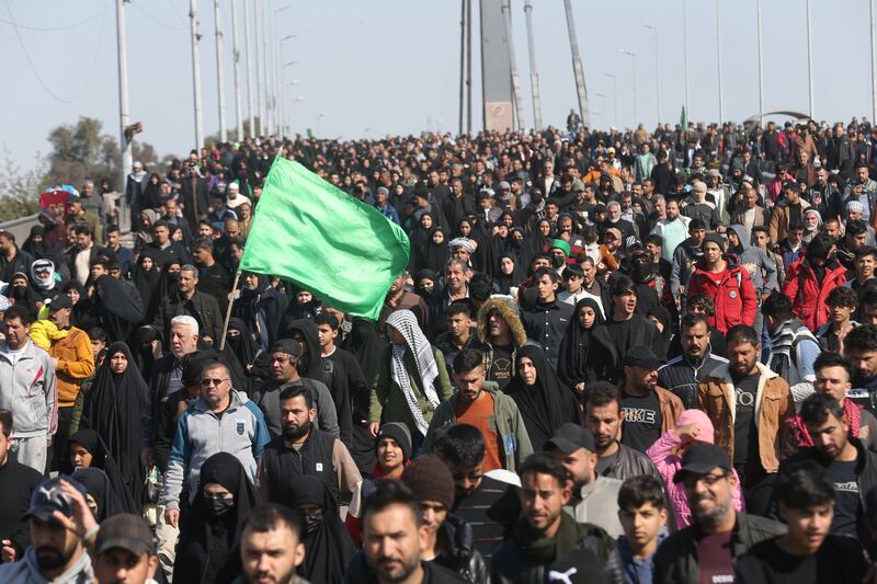 Shiite pilgrims make their way to Kadhimiya to mark the anniversary of Imam Moussa Al Kadhim's death. Reuters