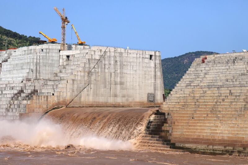 Water flows through Ethiopia's Grand Renaissance Dam as it undergoes construction work on the river Nile in Guba Woreda, Benishangul Gumuz Region, Ethiopia September 26, 2019. Picture taken September 26, 2019. REUTERS/Tiksa Negeri