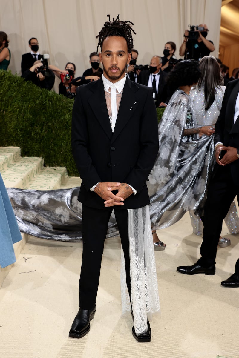 Lewis Hamilton, in a black Kenneth Nicholson suit with lace detailing, attends the Met Gala at the Metropolitan Museum of Art on September 13, 2021, in New York City. AFP