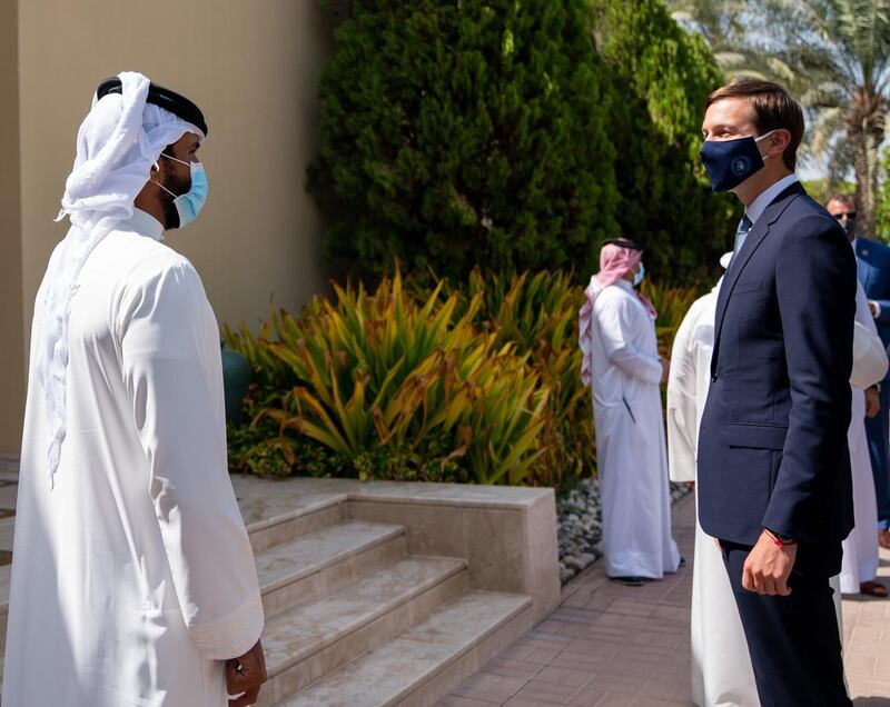 Mask-clad US Presidential Adviser Jared Kushner meeting with Sheikh Nasser bin Hamad Al Khalifa  in Bahrain. AFP