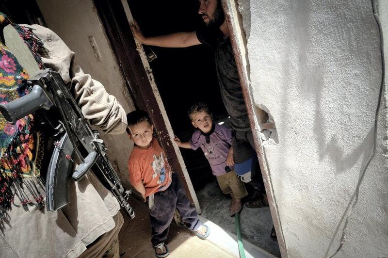 Children in heavily fought over neighbourhood in central Raqqa. Photo: David Pratt for The National