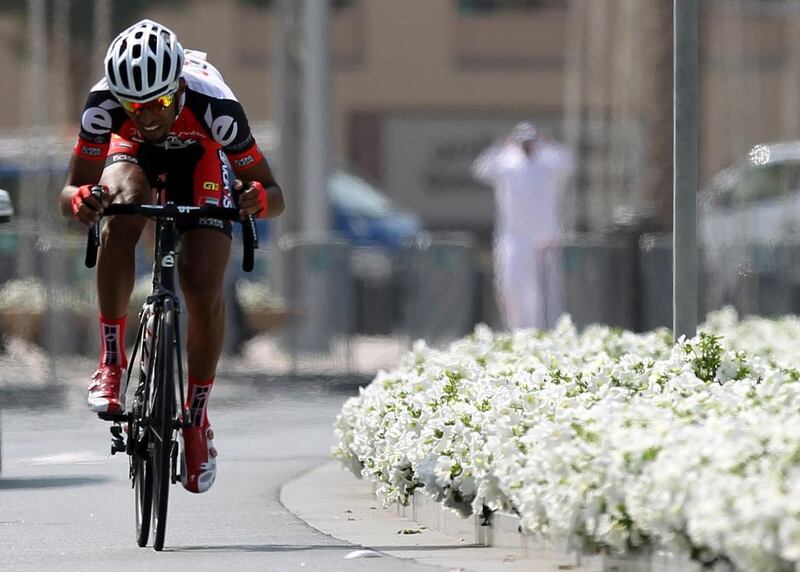 UAE rider Nawaf Al-Balooshi of Skydive Dubai Pro Cycling Team competes in the first stage of the Dubai Tour cycling race, a 9.9 km individual time trial, in Dubai on Wednesday. Ali Haider / EPA