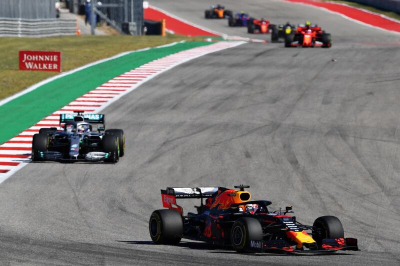 AUSTIN, TEXAS - NOVEMBER 03: Max Verstappen of the Netherlands driving the (33) Aston Martin Red Bull Racing RB15 leads Lewis Hamilton of Great Britain driving the (44) Mercedes AMG Petronas F1 Team Mercedes W10 on track during the F1 Grand Prix of USA at Circuit of The Americas on November 03, 2019 in Austin, Texas.   Clive Mason/Getty Images/AFP