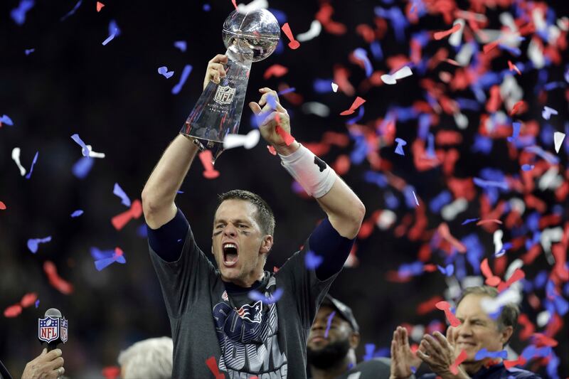 New England Patriots' Tom Brady raises the Vince Lombardi Trophy after defeating the Atlanta Falcons in overtime in the 2017 Super Bowl in Houston. AP