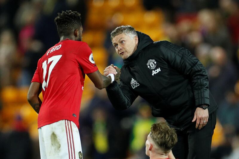 Soccer Football - Premier League - Norwich City v Manchester United - Carrow Road, Norwich, Britain - October 27, 2019  Manchester United manager Ole Gunnar Solskjaer shakes hands with Fred after the match    Action Images via Reuters/John Sibley  EDITORIAL USE ONLY. No use with unauthorized audio, video, data, fixture lists, club/league logos or "live" services. Online in-match use limited to 75 images, no video emulation. No use in betting, games or single club/league/player publications.  Please contact your account representative for further details.