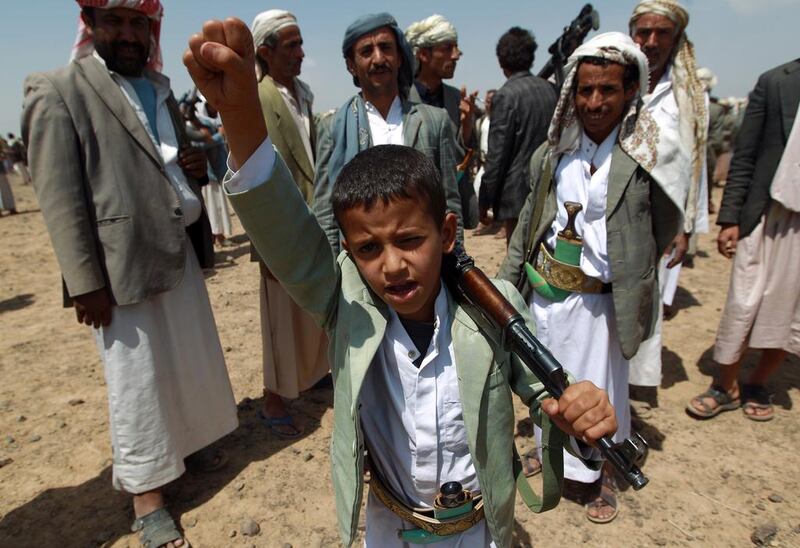 There is no moral justification for arming children like this Houthi-supporting boy in Yemen.  (Mohammed Huwais / AFP) 