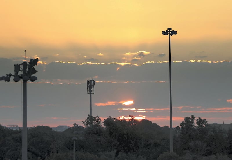 Abu Dhabi, United Arab Emirates - Reporter: Jon Turner: The sun sets during the third place play-off between Novak Djokovic v Karen Khachanov at the Mubadala World Tennis Championship. Saturday, December 21st, 2019. Zayed Sports City, Abu Dhabi. Chris Whiteoak / The National