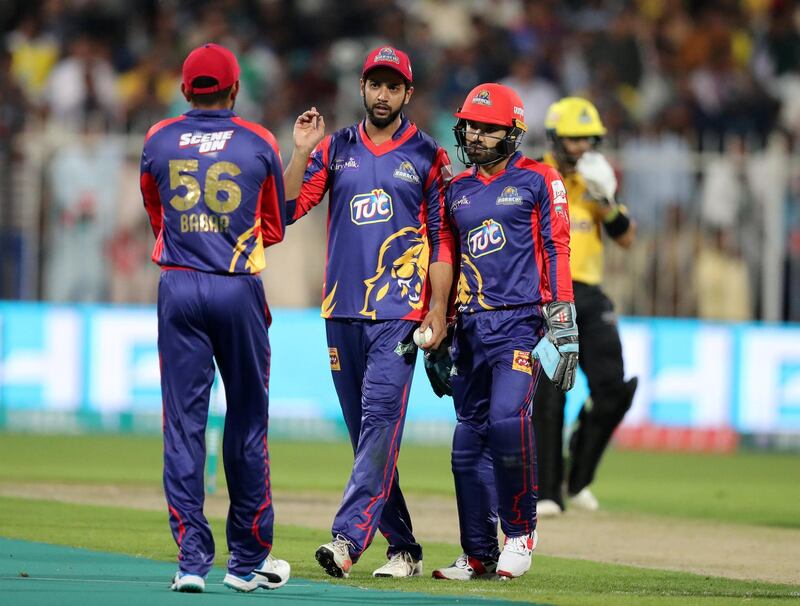 Sharjah, United Arab Emirates - February 21, 2019:  Karachi's captain Imad Wasim (M) speaks to his players during the game between Peshawar Zalmi and Karachi Kings in the Pakistan Super League. Thursday the 21st of February 2019 at Sharjah Cricket Stadium, Sharjah. Chris Whiteoak / The National