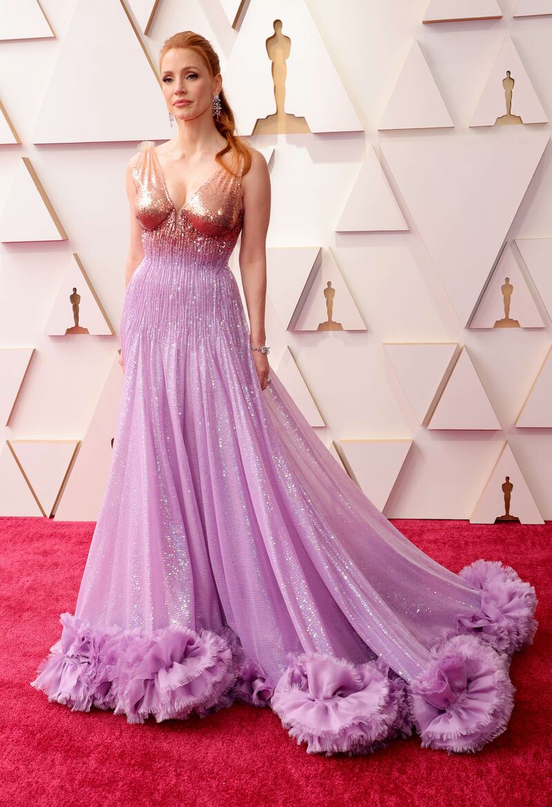 Jessica Chastain, wearing purple and gold sequinned Gucci. Getty Images