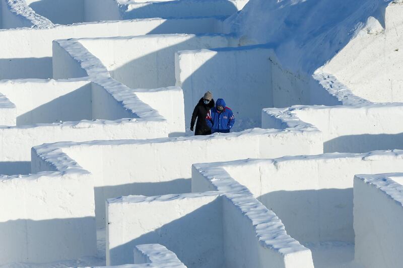 Visitors navigate a giant snow maze in St Adolphe, Manitoba, Canada. It is larger than one constructed on the same site in 2019, which was named the world's largest snow maze by Guinness World Records. Reuters