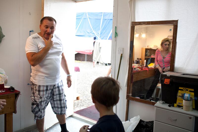 Abu Dhabi, United Arab Emirates, April 28, 2013: 
(L) Jaroslav Valla, who performs under the artist name Jarda Ross, talks with his family as they begin their daily preparations for the evening performances at the Monte Carlo circus, on Sunday, April 28 2013, at the circus new temporary location in Mussafah, an industrial subsection of Abu Dhabi. 
Silvia Razgova / The National
