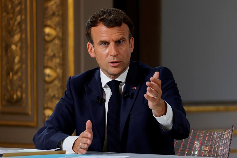 French President Emmanuel Macron gestures as he speaks during a news conference ahead of the G7 Summit, at the Elysee Palace in Paris, France, June 10, 2021. REUTERS/Pascal Rossignol/Pool