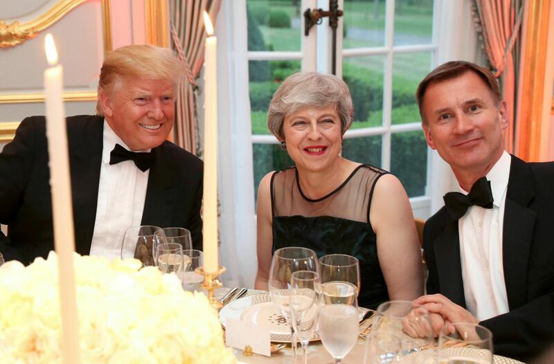 Donald Trump, Theresa May and Foreign Secretary Jeremy Hunt at the Return Dinner at Winfield House. AP