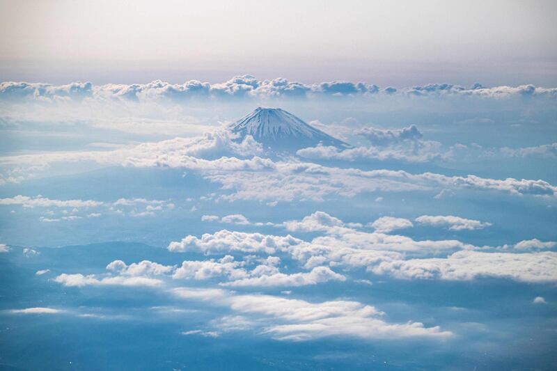 Mount Fuji, Japan's highest mountain at 3,776 metres, seen from the window of a passenger aircraft en route to the southern city of Kagoshima. AFP