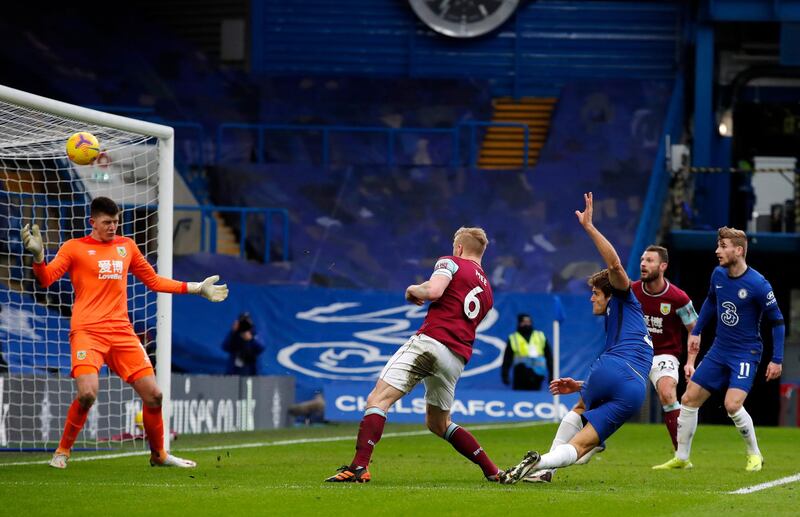 Burnley goalkeeper Nick Pope cannot stop Chelsea's Marcos Alonso making it 2-0. Getty