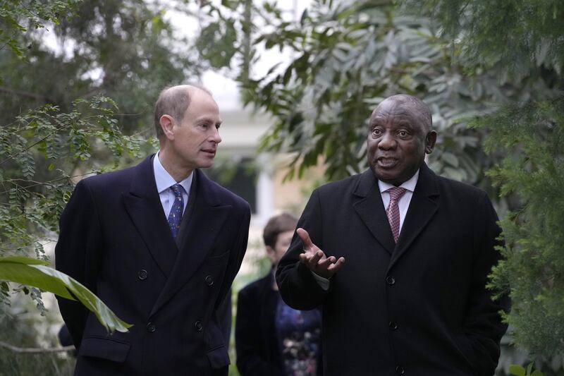 Prince Edward, Earl of Wessex (L), with Cyril Ramaphosa, South African President, at the Royal Botanic Gardens in Kew, south-west London, on Wednesday. PA