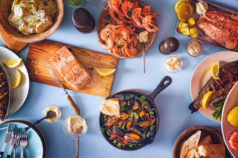 Variation of Grilled Prawns and Salmon with Fresh Lemon. Getty Images