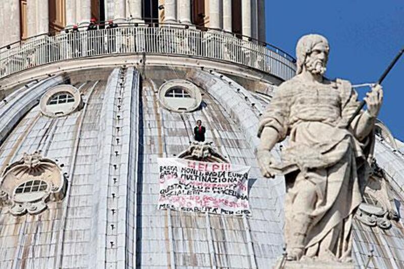 Italian businessman Marcello di Finizio protests on the dome of St Peter's Basilica to protest Italian government and European Union policies.