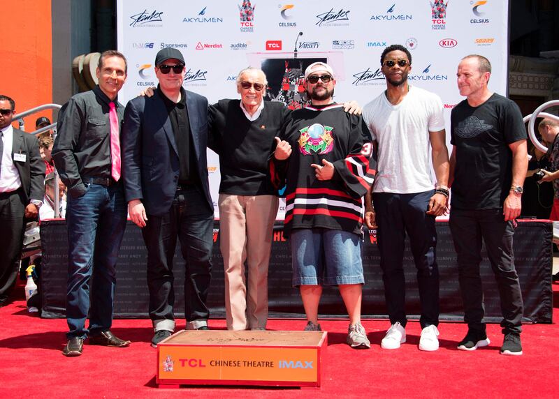 From left: Marvel Studios president Kevin Feige, Comic book artist Todd McFarlane, Comic-book writer, editor, and publisher Stan Lee, actors Kevin Smith, Chadwick Boseman and Clark Gregg attend Stan Lee's hand and footprint ceremony at TCL Chinese Theatre. Valerie Macon / AFP