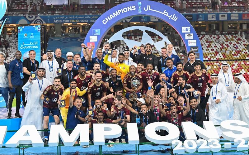 Al Wahda players and coaching staff celebrate after beating Al Ain in the ADIB Cup final at Mohamed bin Zayed Stadium in Abu Dhabi on Friday, May 4. Photo: Al Wahda FC