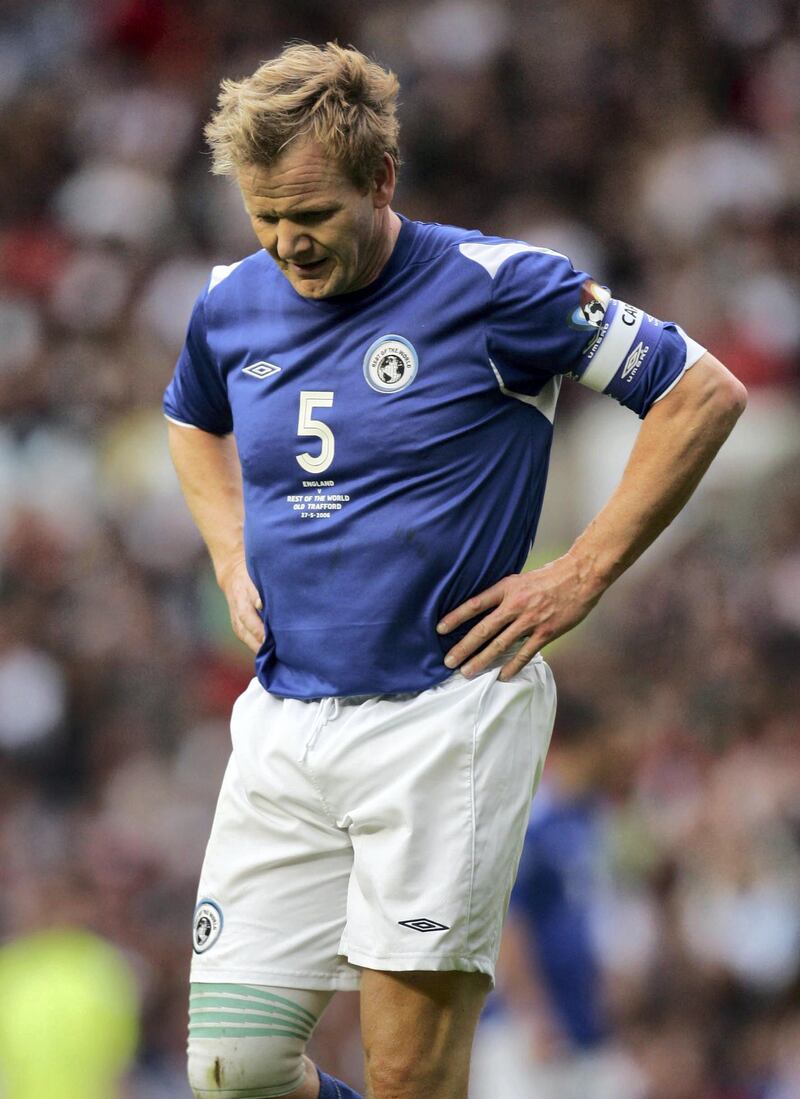 Captain of the Rest of the World XI, celebrity British chef Gordon Ramsey looks dejected during the Soccer Aid charity soccer match at Old Trafford, Manchester, 27 May  2006. All financial proceeds from the celebrity match will be donated to the children's charity UNICEF. AFP PHOTO/MATTHEW ASHTON (Photo by Matthew Ashton / AFP)