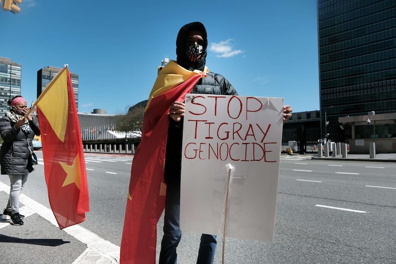 NEW YORK, NEW YORK - MARCH 29: A small group of Tigray protesters gather outside of the United Nations (UN) on March 29, 2021 in New York City. The war-torn northern Ethiopian region has been the location for a conflict between pro-government and local fighters that has resulted in thousands of refugees spilling over the border into Sudan. Following months of denial, Prime Minister Abiy Ahmed of Ethiopia admitted this week that Eritrean troops had been fighting in Tigray. The protesters are calling for the UN to take action against the Ethiopian government.   Spencer Platt/Getty Images/AFP
== FOR NEWSPAPERS, INTERNET, TELCOS & TELEVISION USE ONLY ==
