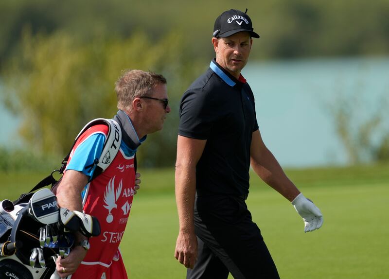 Henrik Stenson of Sweden talks to his caddie on the 18th hole during the first round of Abu Dhabi HSBC Golf Championship on Thursday, January 19, 2023. AP