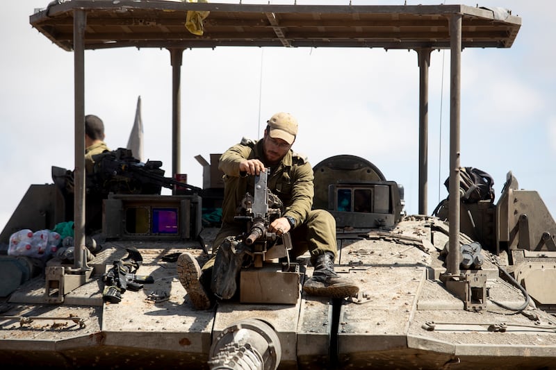An Israeli tank crew prepare to enter the Gaza Strip. The International Court of Justice found in January 26 that there was a 'plausible' risk of genocide in the enclave. Getty Images