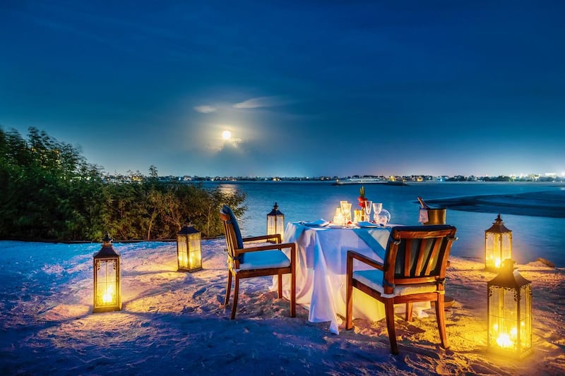 Beachside dining at the Ritz Carlton Al Hamrah. Courtesy of Ritz Carlton Al Hamrah