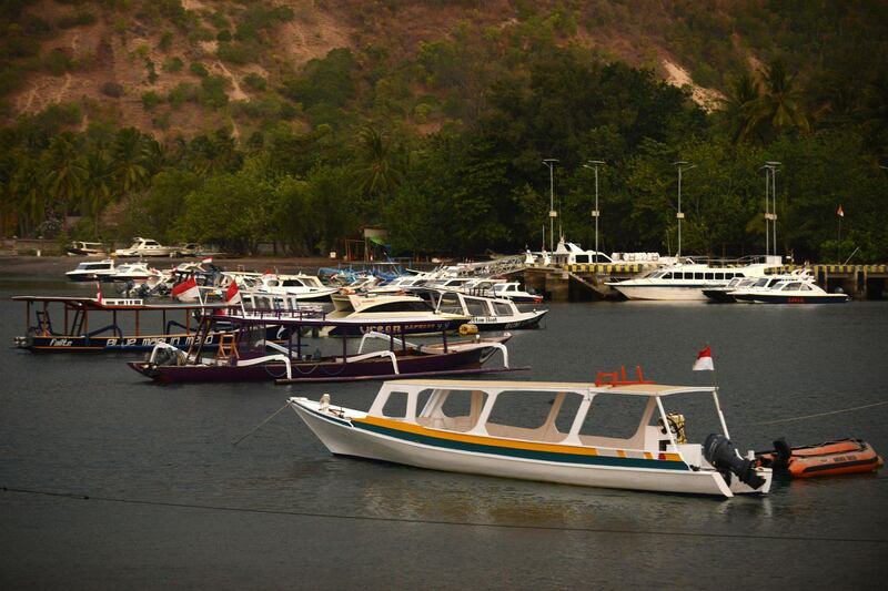 Tourist rental boats moored after the recent quakes at Teluk Nare port in Pemenang in northern Lombok island.  AFP