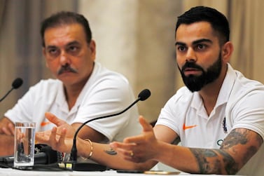 epa07747494 India's national cricket team captain, Virat Kohli (R) and team coach Ravi Shastri (L), attend a pre-departure press conference in Mumbai, India, 29 July 2019. Team Indian travels to the USA and West Indies to play three T20's, three ODI's and two Test cricket with West Indies cricket team. EPA/DIVYAKANT SOLANKI