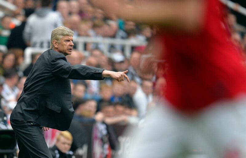 Arsenal's manager Arsene Wenger reacts to his side's performance against Newcastle during their English Premier League soccer match at St James' Park in Newcastle, northern England, May 19, 2013. REUTERS/Russell Cheyne  (BRITAIN - Tags: SPORT SOCCER) FOR EDITORIAL USE ONLY. NOT FOR SALE FOR MARKETING OR ADVERTISING CAMPAIGNS. NO USE WITH UNAUTHORIZED AUDIO, VIDEO, DATA, FIXTURE LISTS, CLUB/LEAGUE LOGOS OR "LIVE" SERVICES. ONLINE IN-MATCH USE LIMITED TO 45 IMAGES, NO VIDEO EMULATION. NO USE IN BETTING, GAMES OR SINGLE CLUB/LEAGUE/PLAYER PUBLICATIONS *** Local Caption ***  CRC08_ENGLAND-SOCCE_0519_11.JPG