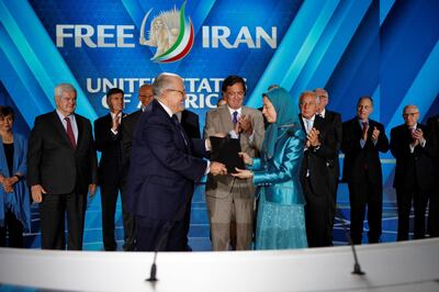 Former US mayor of New York Rudy Giuliani with Iran's opposition leader Maryam Rajavi as the pose with Statement by 33 Former Senior U.S Officials &amp; Dignitaries . Annual gathering of Free Iran-Alternative 100 ASHRAF at the Villepinte exhibition North of Paris, France, June 30, 2018. Saturday, June 30, 2018, the Iranian Resistances grand gathering was held in Paris, France. Delegations from various countries including prominent politicians, members of parliaments, mayors, elected representatives, and international experts on Iran attended the event.  The speakers declared their support for the Iranian peoples uprising and the democratic alternative, the National Council of Resistance of Iran.  They called on the international community to adopt a firm policy against the mullahs regime and stand by the arisen people of Iran. Siavosh Hosseini (Photo by Siavosh Hosseini/NurPhoto via Getty Images)