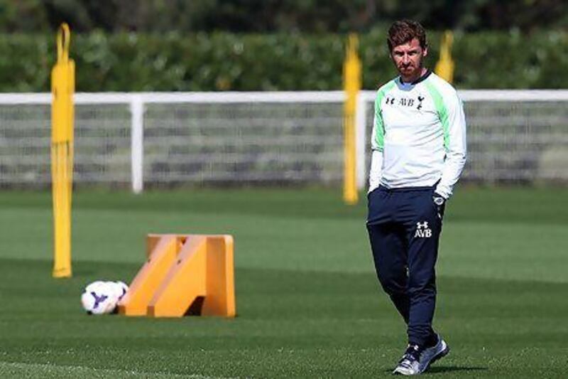 Andres Villas-Boas takes a training session at Tottenham's training ground yesterday. Clive Rose / Getty Images