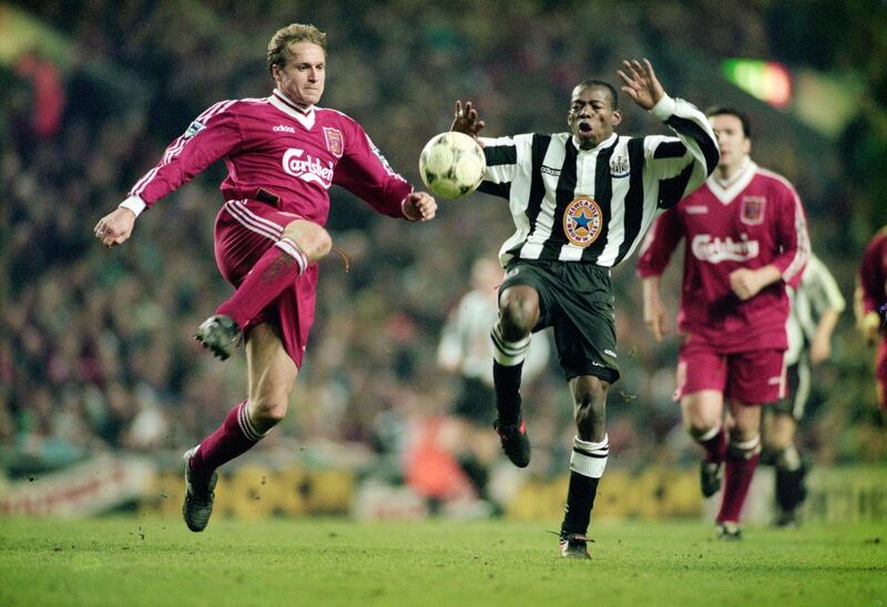LIVERPOOL, UNITED KINGDOM - JULY 06:  Liverpool defender John Scales (l) challenges Newcastle forward Faustino Asprilla (r) during the 4-3 Premier League match between Liverpool and Newcastle United at Anfield on April 3, 1996 in Liverpool, England.  (Photo by Stu Forster/Allsport/Getty Images)