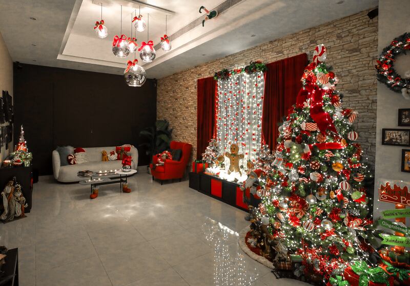 Red, green and white decorations fill the living room 